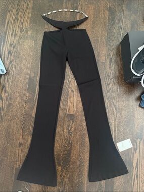 The Attico Black remi cut pants with chain bell bottom